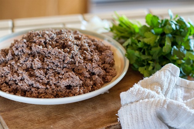 Cook the hamburger on the stove until crumbly