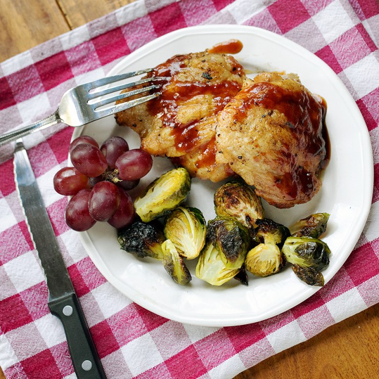 Barbecued chicken with roasted Brussels Sprouts and grapes.  Simple and tasty