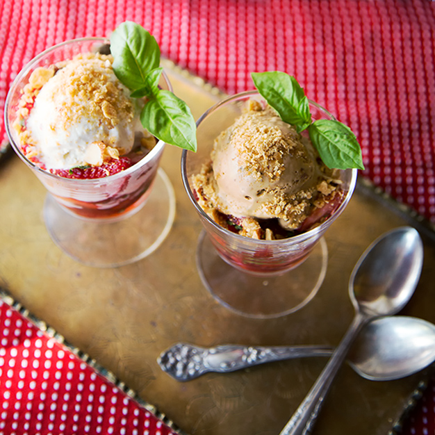 Basil Strawberries with either Vanilla Bean Ice Cream or Salted Caramel Gelato and a roasted butter cracker/brown sugar/almond crumble