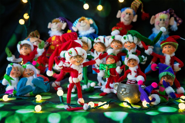 Elves happily sing Christmas Carols
