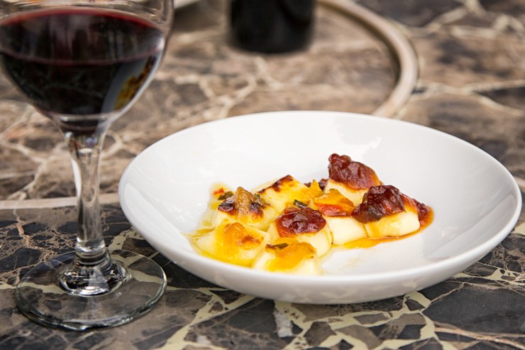 Bread Cheese with toppings and red wine