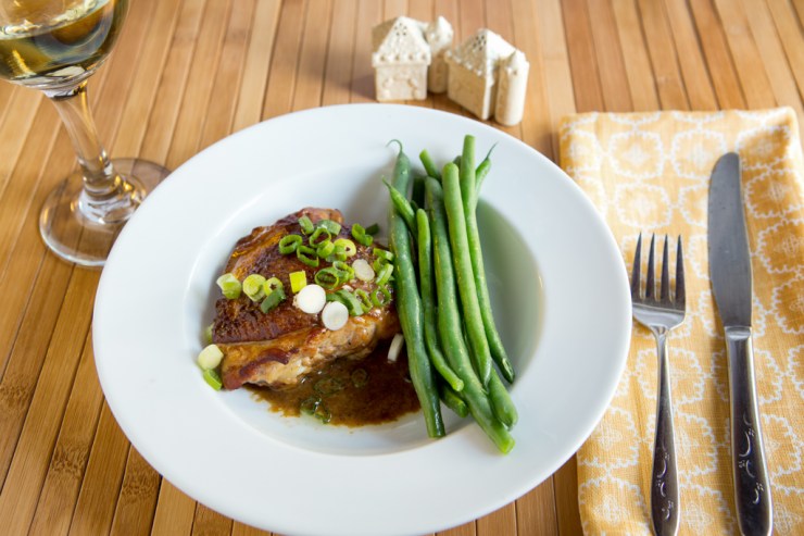 More formal napkin style with subtle color more closely matching the background and the chicken