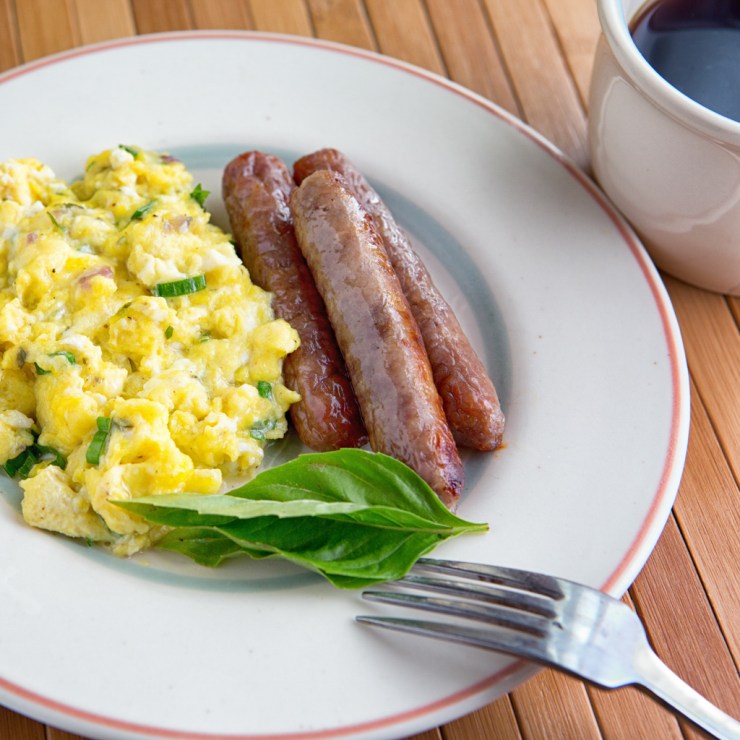 Scrambled eggs with Herb Butter and cheese.